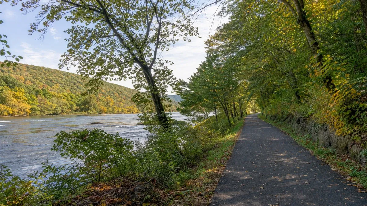 Riverside Trails illustrated waterway scene